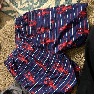 Men’s M lobster swimming trunks.